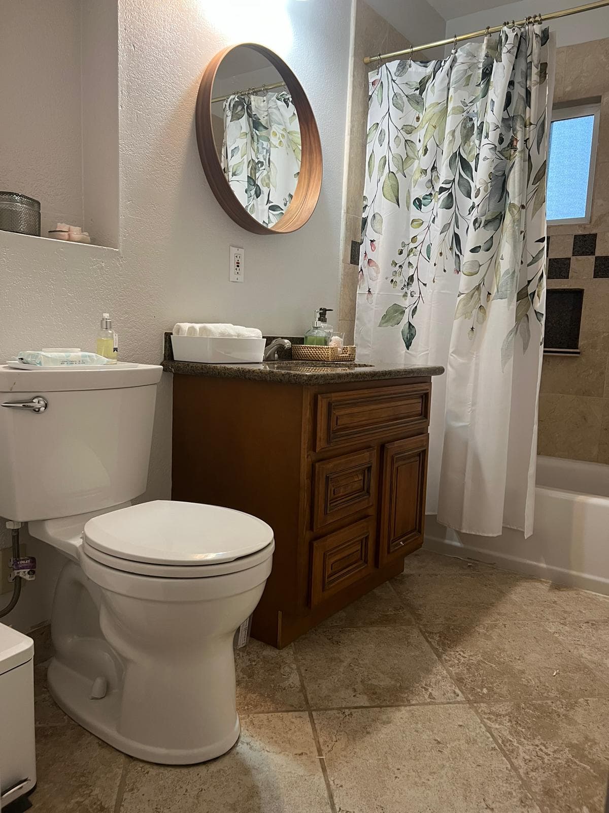 Private bathroom with bathtub and shower