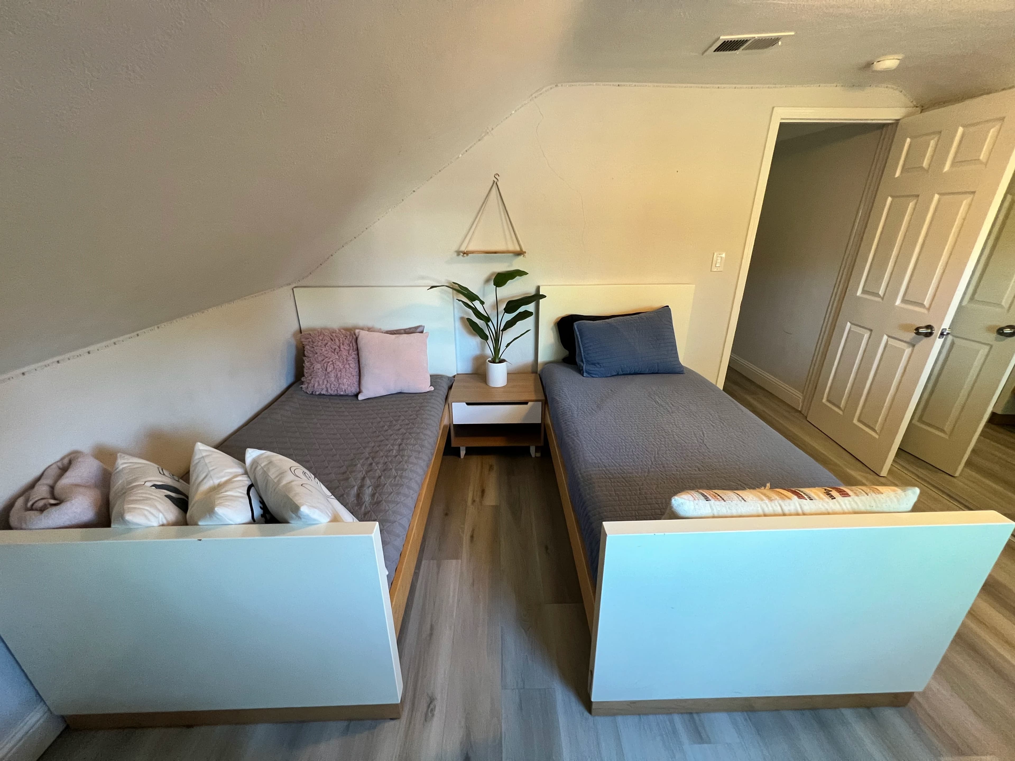 Second-floor room with two separate beds